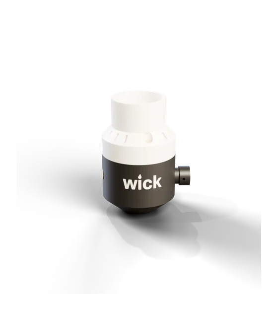 wick in Tuxedo: white top, black base, white wordmark